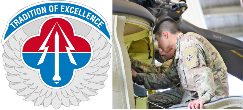 Soldiers performing  an abbreviated corrosion control inspection on an CH-47 Chinook helicopter
