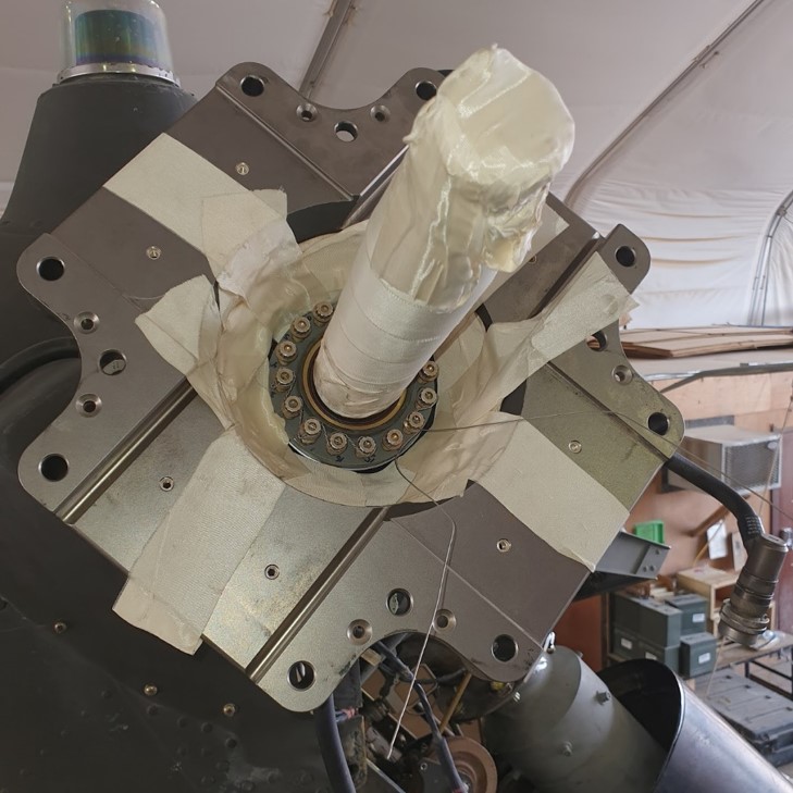 Protect inboard retention plate with tape