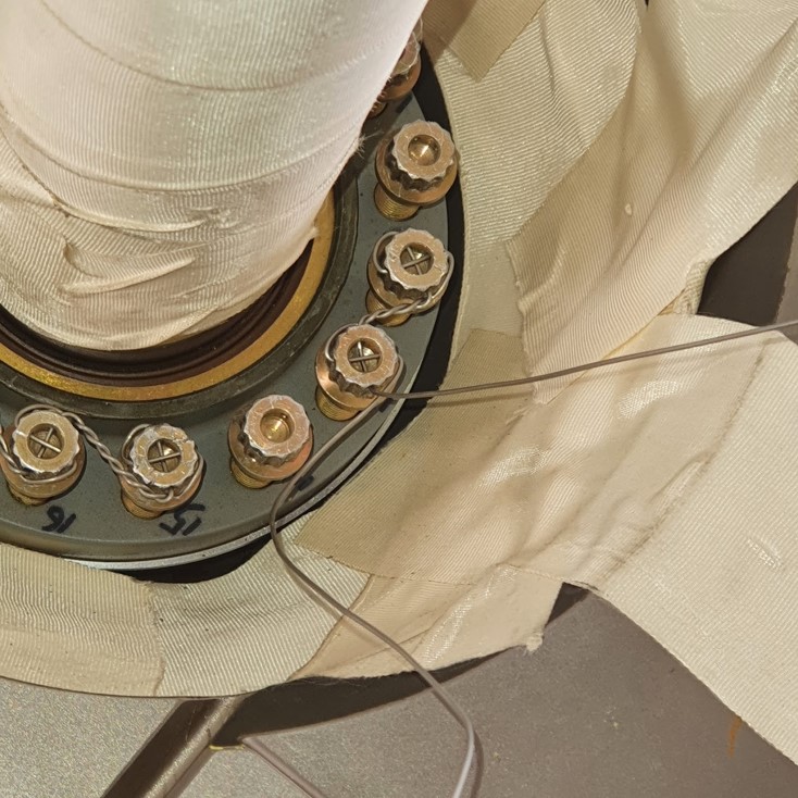 Use tape before lock wiring around retention plate