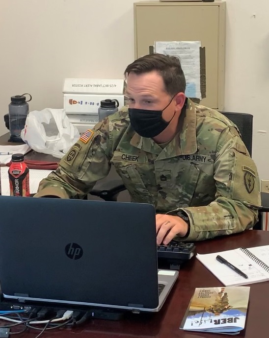 SFC Wesley Cheek 4/25 IBCT (ABN) Maintenance Manager, logged into GCSS-Army and looking at the BDE's CODE H on the ESR (photo by CPT Stephanie Churchman).